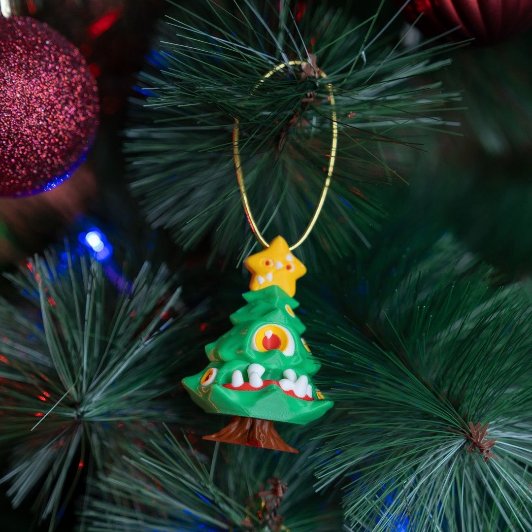 Árbol Mimic Navideño con ojos y dientes impresos en 3D