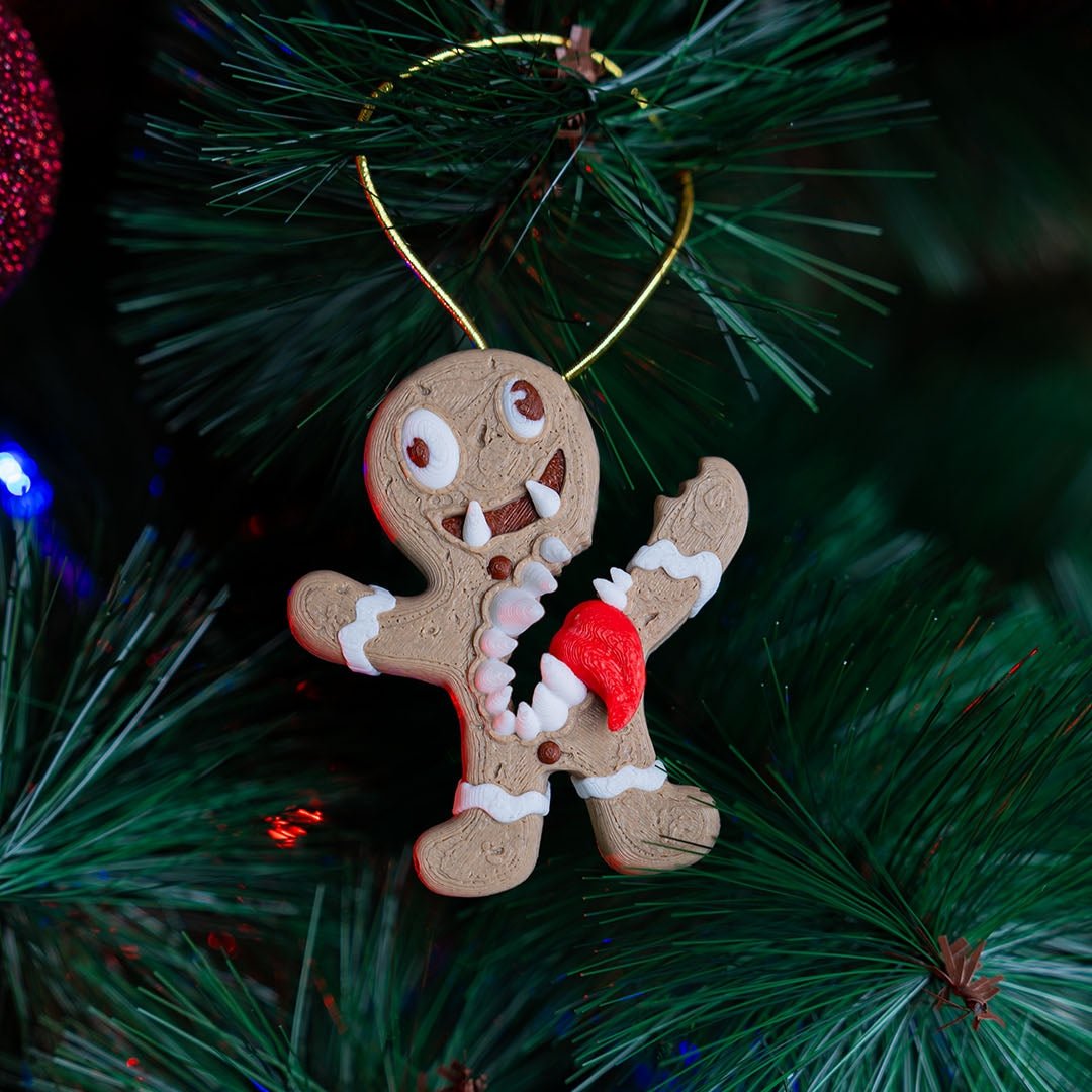 Mimic de jengibre navideño con dientes y lengua roja